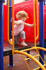 Fototapeta premium beauty little girl on playground