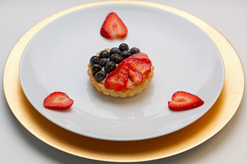 fruit tart with strawberries and blueberries