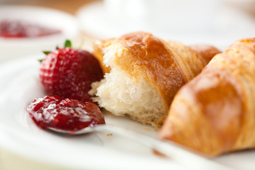 Croissant with strawberry jam