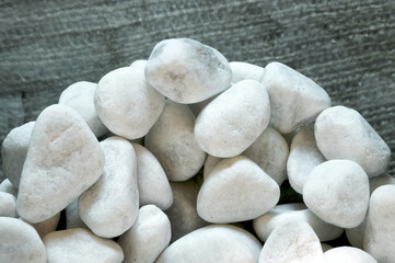 white stones stacked in a vase