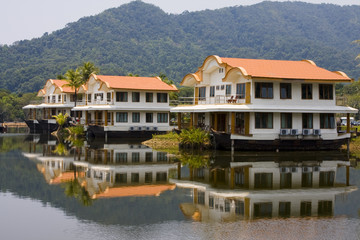 Fototapeta premium Tropical hotel on the background of mountains in Thailand