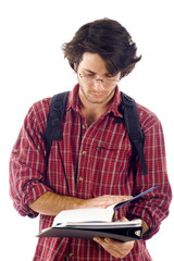 College Student Attentively Reading a Book