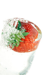 strawberries in a glass of water