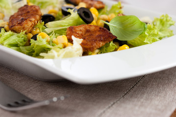 Roast chicken with lettuce,sweetcorn and olives