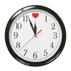 concept of clock and love symbol isolated on white background