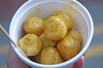 Curry fish balls at an Asian Chinese food market