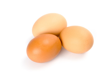 three brown eggs