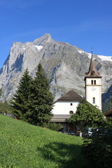 Fototapeta na wymiar Wetterhorn Mountain and church in Switzerland
