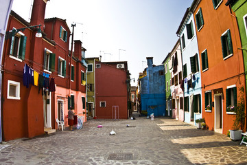 Fototapeta na wymiar street of colorful houses in the village of Burano, Venice