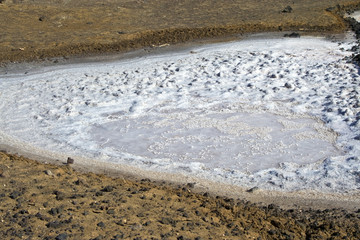 dry salt lake at the coast line