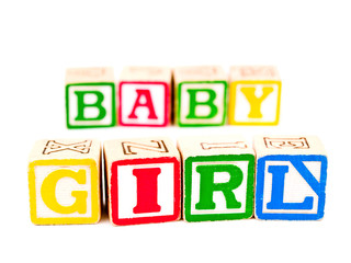 Colorful Alphabet Blocks Spelling the Words BABY GIRL