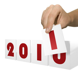 Hand holds calendar card for change of date