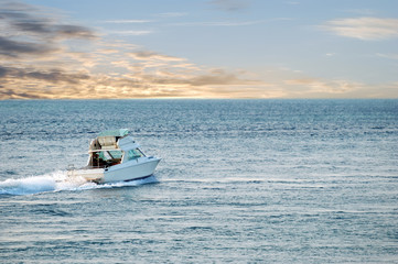 white cabin cruiser