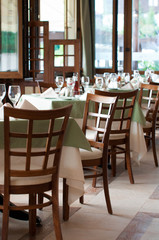 Fototapeta na wymiar Dining tables ready for customers