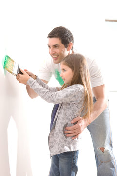 Father And Daughter Renovating Home