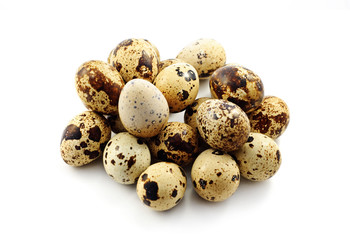 Quail  eggs on the white