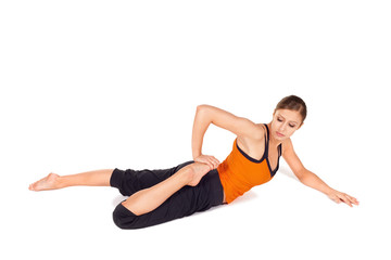 Fototapeta na wymiar Fit Attractive Woman Practicing Yoga Pose
