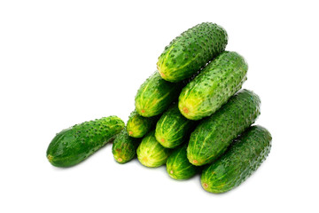 Green ripe cucumbers on a white background
