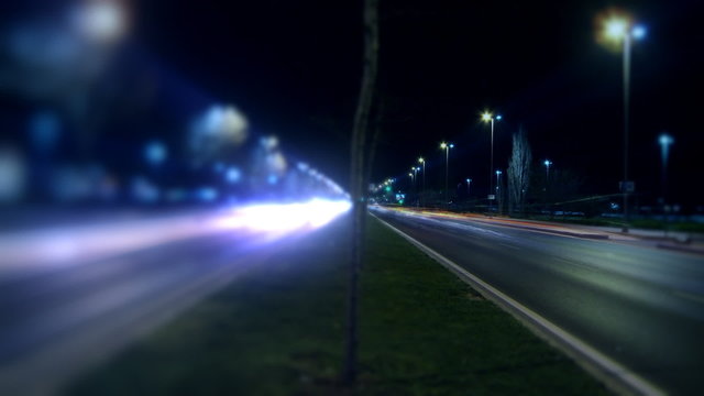 Timelapse night traffic on boulevard. HD 1080p, Selective focus.