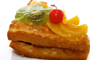 piece of delicious cake isolated on white b