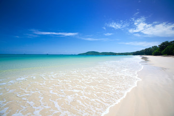 Beautiful white sandy beach with crystal clear blue water