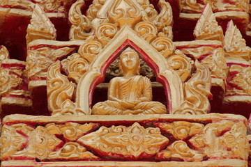 Fototapeta na wymiar buddhist art on gable of temple, Wat Ku Ka Singh, Roi-Et