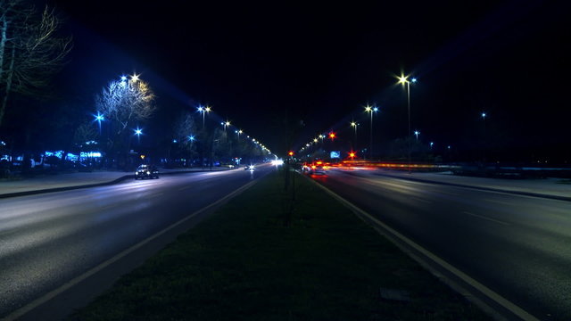 Timelapse night traffic on boulevard. HD 1080p.