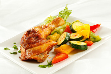 Roasted chicken leg and vegetables