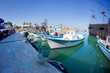 Obraz premium fishing boats at a port