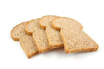 Slices brown bread over white background