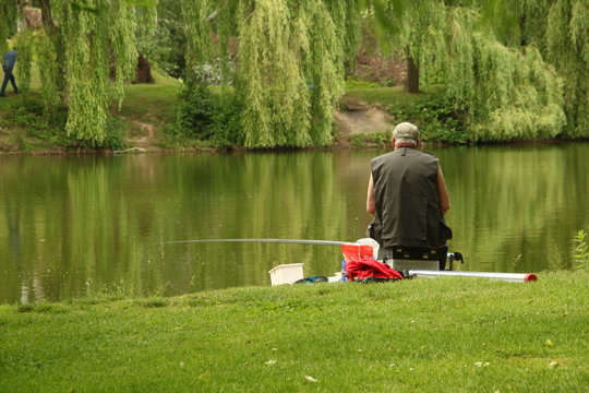 p&ecirc;cheur en &eacute;tang