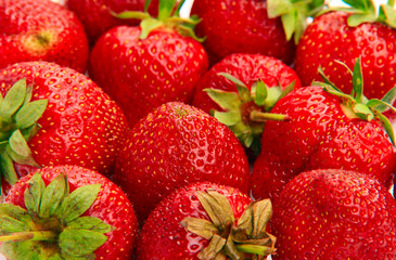 Macro shot of strawberries piled up