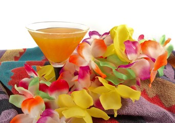 orange cocktail and  Hawaiian lei