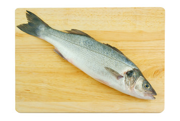 Fresh raw fish on chopping board isolated