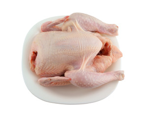 Raw chicken in plate isolated on white background