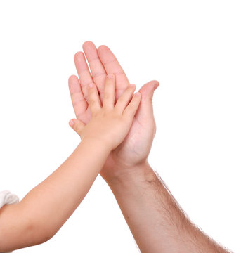 Hand shake of the child and father