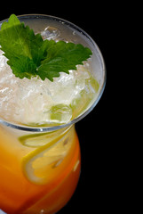 Ice tea close up above on black