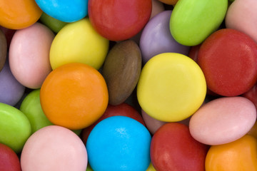 Fototapeta na wymiar colorful candy coated chocolate sweets
