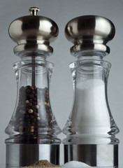 Obraz na płótnie Canvas Towering Salt and Pepper Shakers