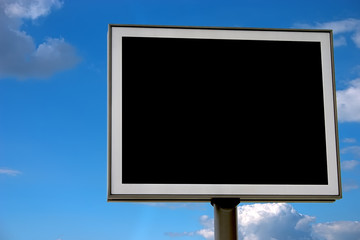 Blank black billboard over cloudy sky