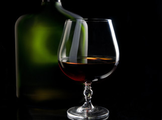 Gognac glass and bottle © Anton Violin # 23737125
