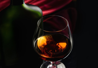 Brandy glass and bottle © Anton Violin # 23737369