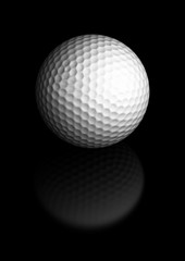 balle de golf blanche sur un fond noir avec reflet - sport
