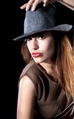Beautiful fashion woman portrait with grey hat