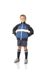 Young boy in football uniform