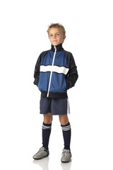Fototapeta premium Young boy in football uniform