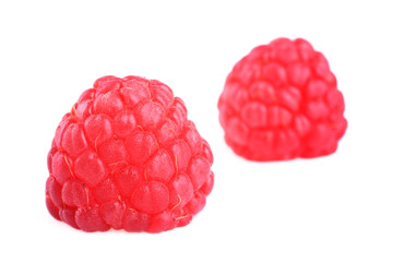 Two fresh raspberries isolated on white
