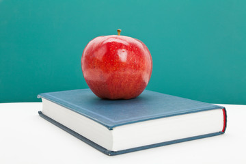 Red apple and Textbook