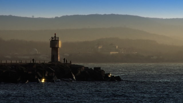 Lighthouse near harbor. HD 1080p, DOF.