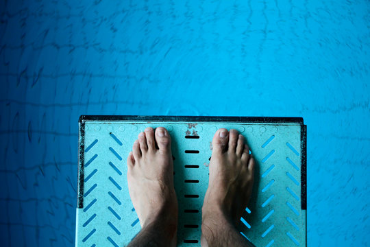 feet on diving board